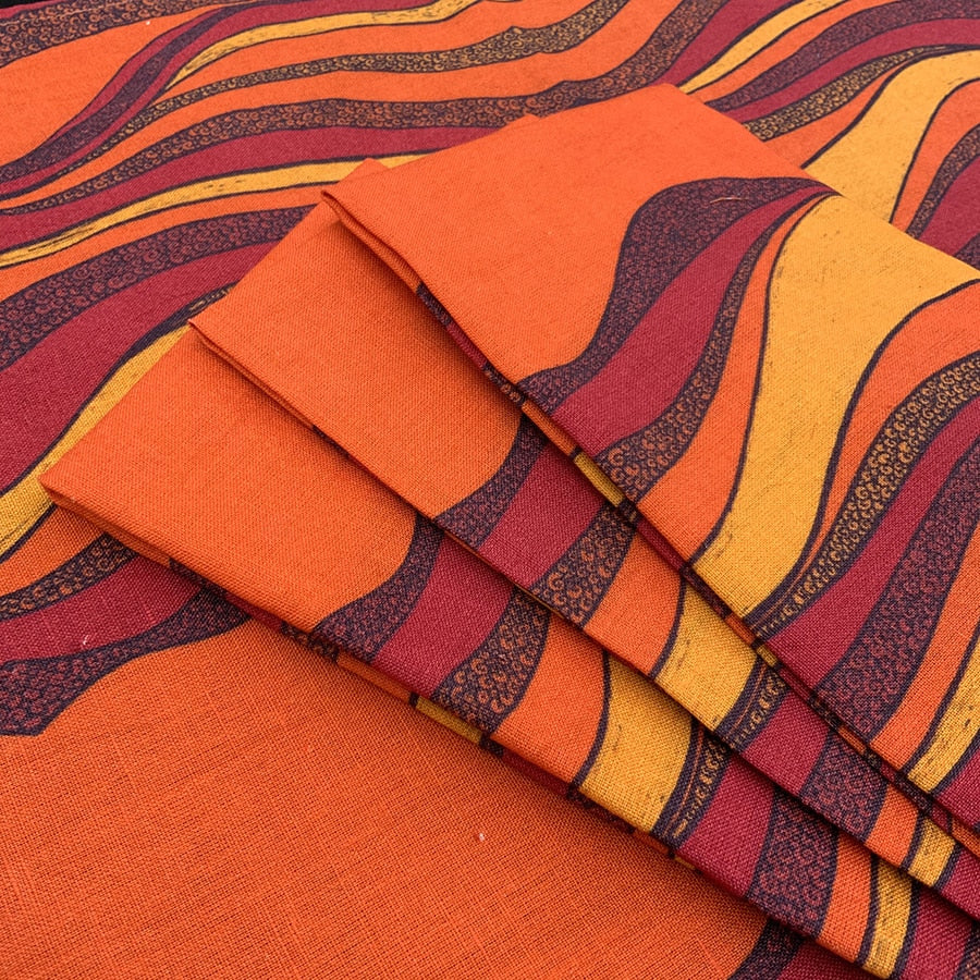folded dessert sun orange table napkins