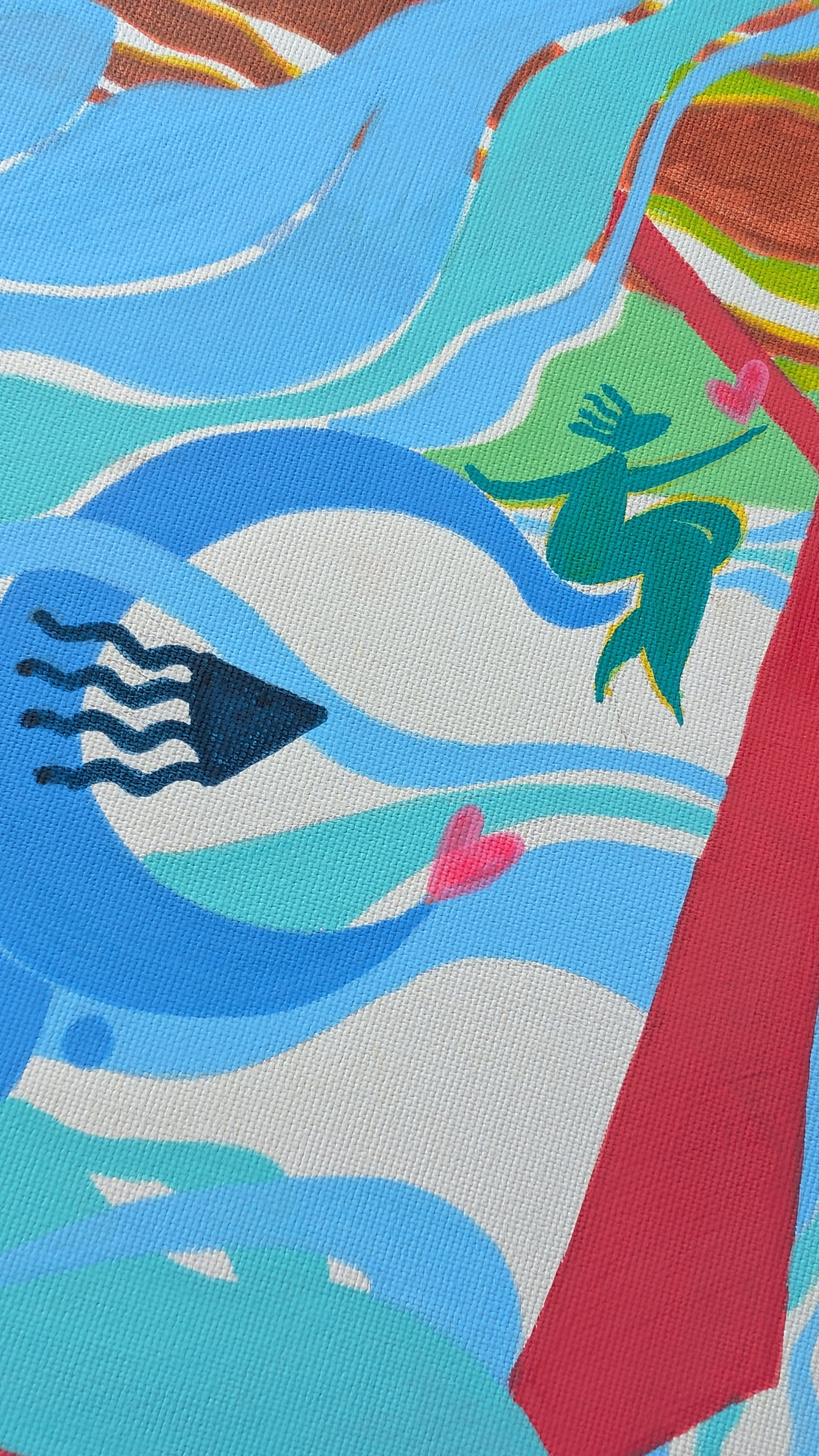 A close-up of a colorful abstract textile or fabric print with flowing blue and white waves, a teal mermaid figure, pink hearts, and a dark blue motif. By Loveleen Saxena 