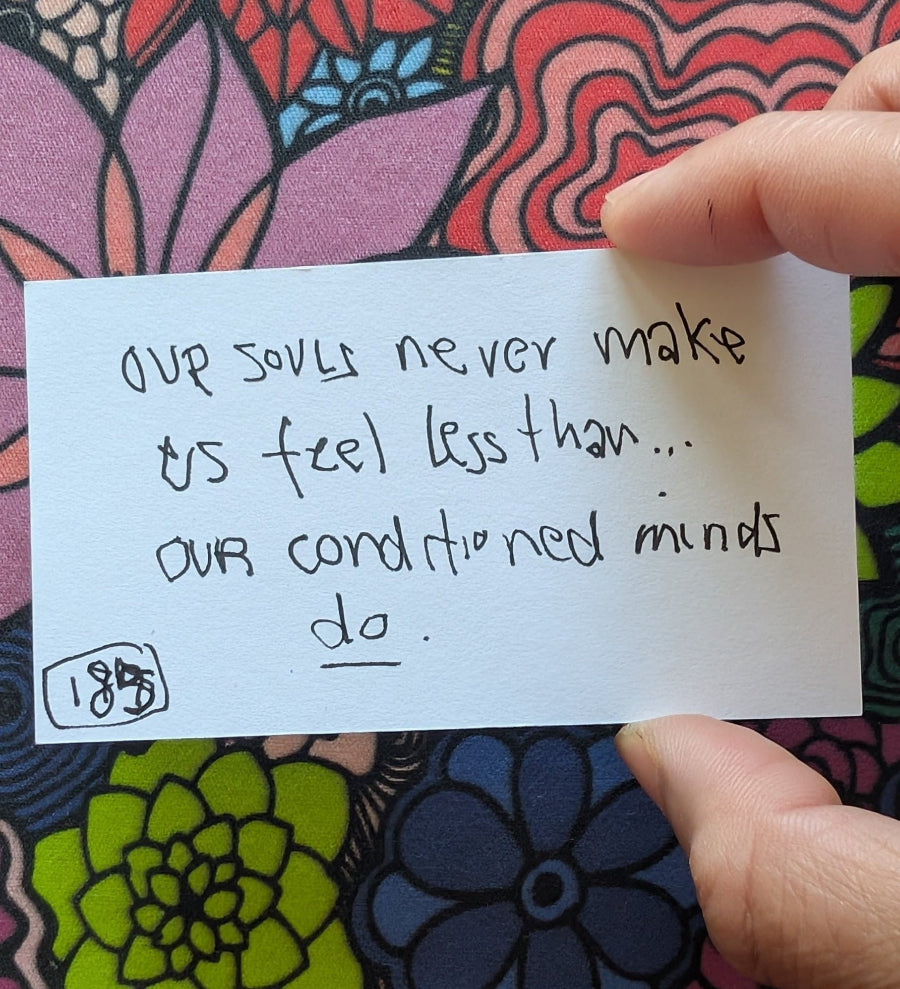 Handwritten note on a colorful floral background