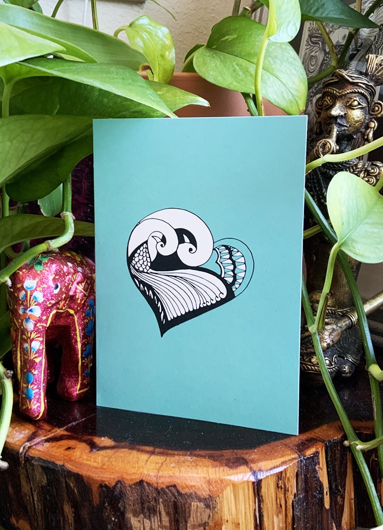 Spread the love doodle  heart card with light blue background