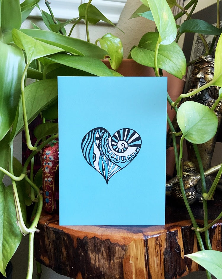 Spread the love doodle  heart card with sky blue background